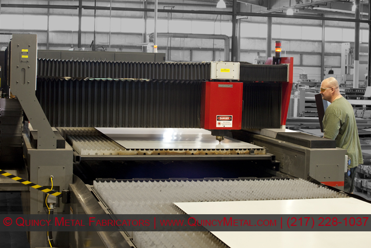 One of two lasers, Quincy Metal Fabricators' Cincinnati CL440 Laser cutting 20 gauge steel at 800 ipm
